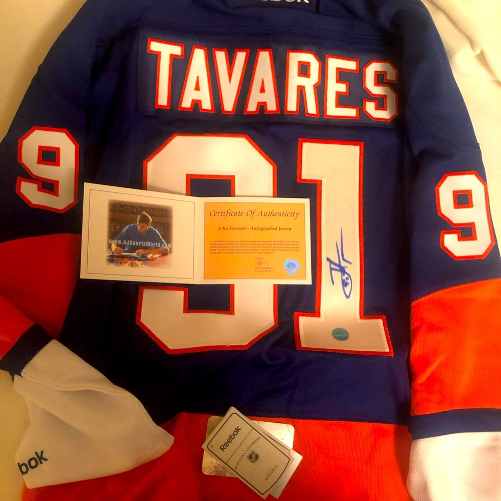 Autographed John Tavares jersey with certificate of authenticity.